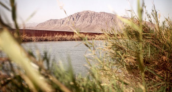 US Mexico Border Fence - by Frank Rogozienski